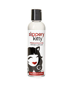 Slippery Kitty Silicone Lubricant bottle with pump on a bathroom shelf