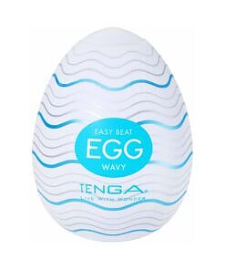Tenga Egg Wavy masturbator showing undulating ribbed interior texture through a semi-transparent sleeve against a clean backdrop.