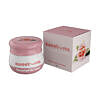 Sweetums Flavored Lip Balm Sweet Rose tube with soft pink tint and rose petal backdrop.
