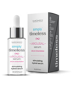 Wicked Simply Timeless Arousal Serum 0.1 oz bottle with drop applicator on a soft nightstand