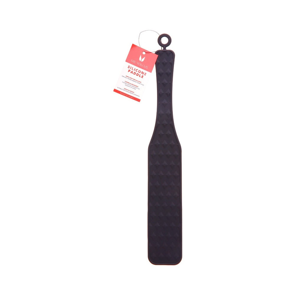 Me You Us Silicone Paddle with glossy black finish and smooth striking surface against a dark backdrop.