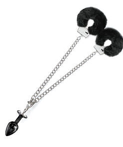 showing shiny jewel plug and plush fur cuffs on white backdrop.