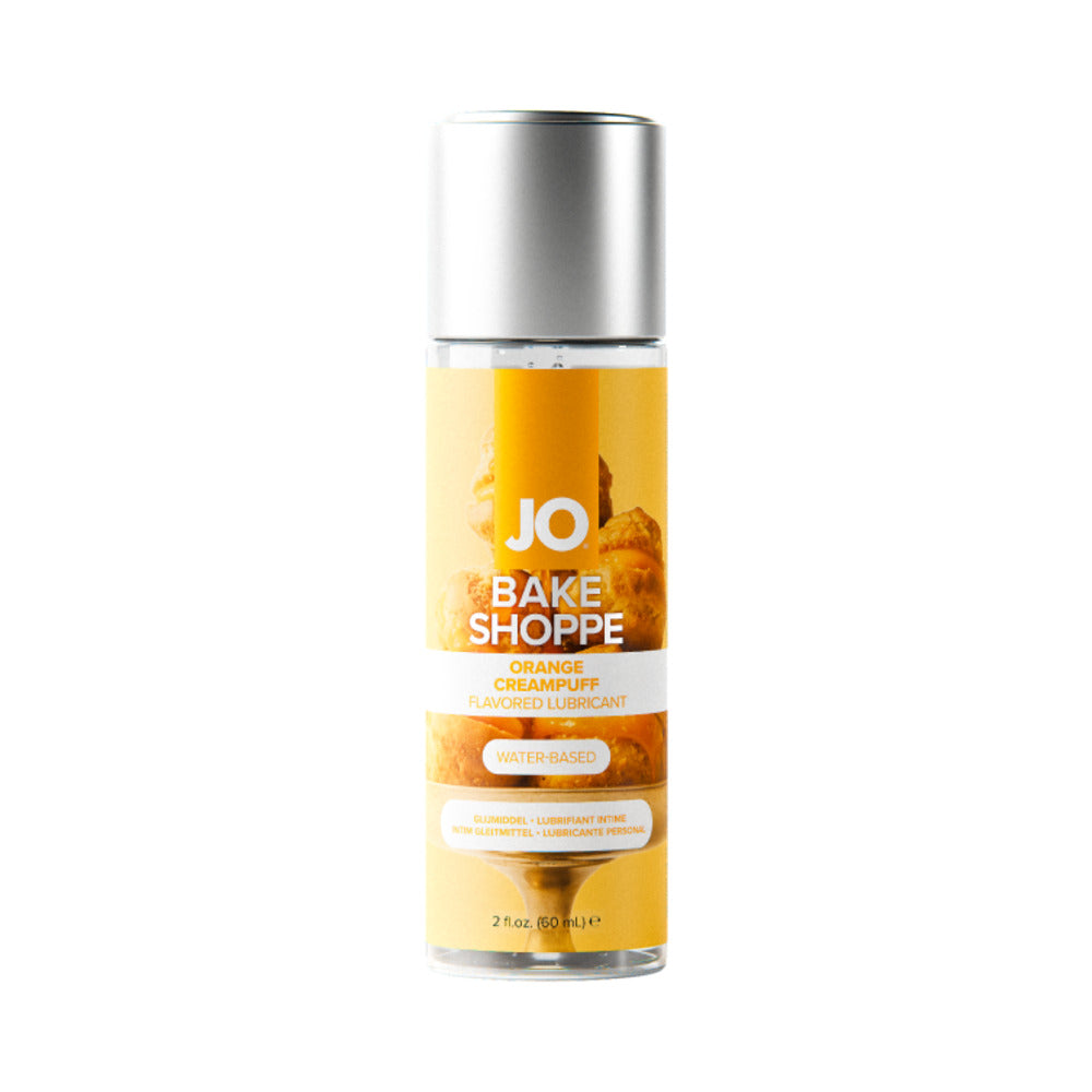 JO Bake Shoppe Orange Creampuff lubricant 2 oz bottle on white surface with dessert-themed label.