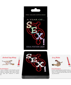 Sex Card Game deck with romantic prompts scattered on a satin sheet next to two glasses of wine and dim candlelight.