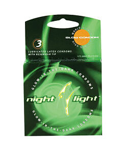 Night Light Glow-In-The-Dark Condoms (3 Pack) pack of three unwrapped condoms glowing green in a dark room setting.