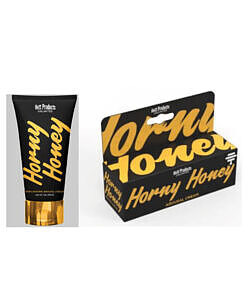 Horny Honey Stimulating Cream 1oz tube on satin sheet with rose petal