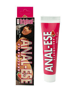 Anal-Ese strawberry desensitizing cream 0.5 oz tube beside a strawberry