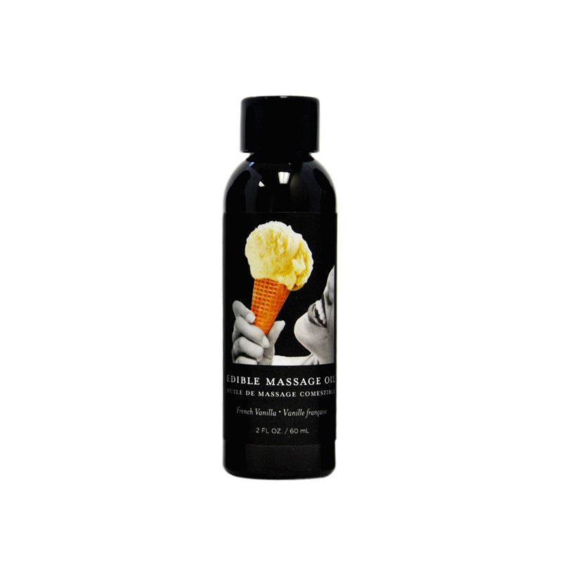 Earthly Body Edible Vanilla Massage Oil 2oz bottle with vanilla beans on a natural massage setup
