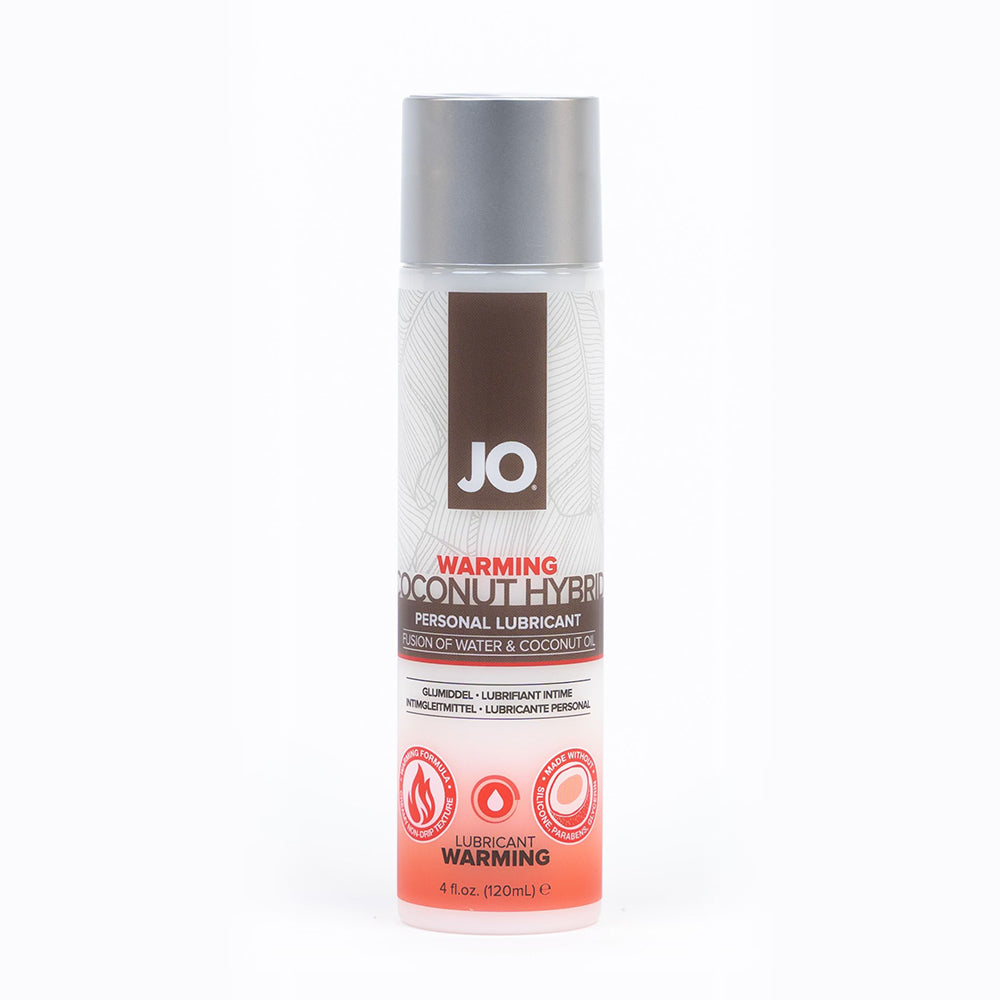 System JO Coconut Hybrid Warming Lubricant 4 oz bottle on a light surface with coconut shells in the background
