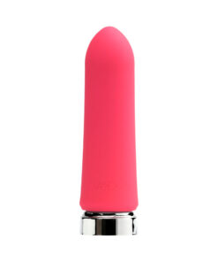showing the sleek silicone body and USB charging cable beside it.