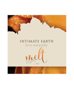Intimate Earth Melt Warming Glide 3ml foil packet on a neutral background with cinnamon stick accent.