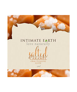 Front view of Intimate Earth Salted Caramel 3ml foil packet with caramel drip design and stevia label.