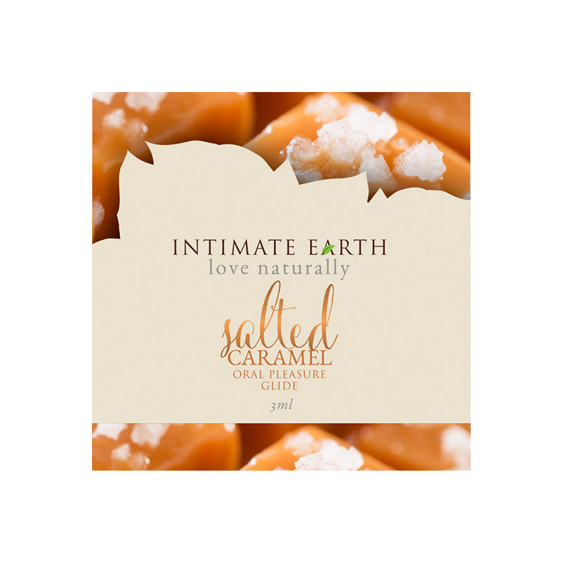 Front view of Intimate Earth Salted Caramel 3ml foil packet with caramel drip design and stevia label.