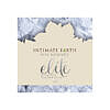 Intimate Earth Elite Silicone 3ml foil packet next to a fingertip showing texture and size.
