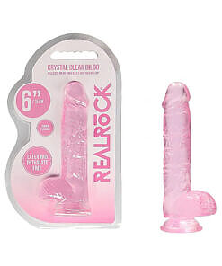 RealRock Crystal Clear Realistic 6 inch pink dildo with balls and suction cup on a white background.