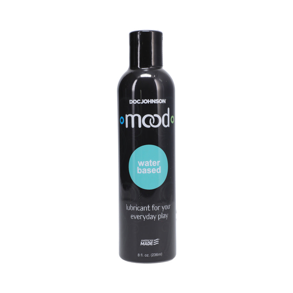 Mood Lube Water-Based 8 fl oz bottle with flip cap next to a silicone toy