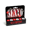 Two acrylic dice from the Sexy 6 Dice Game (Sex Edition) lying on a red satin sheet
