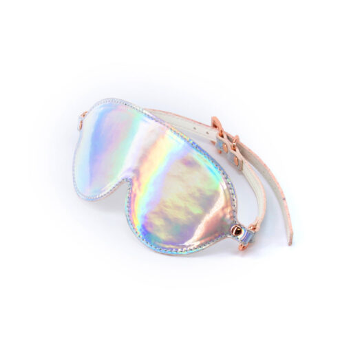 holographic rainbow sheen and rose gold buckle visible.