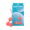 Two coral ribbed silicone Kegel balls