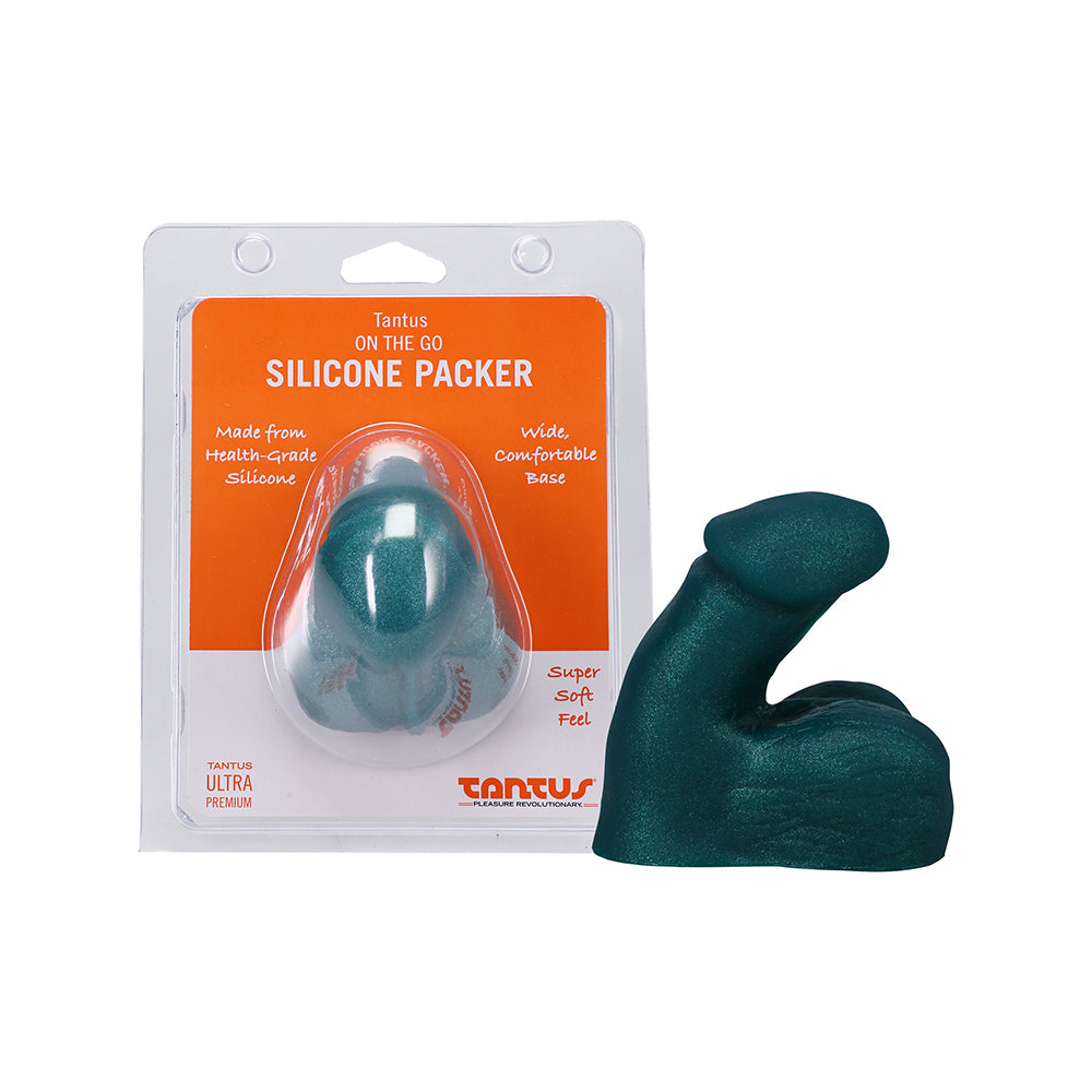 Tantus On The Go silicone packer in super soft emerald held in hand