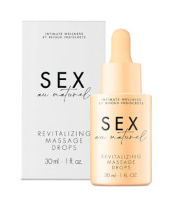 Sex au Naturel Revitalizing Massage Drops bottle with silky oil drops on a warm