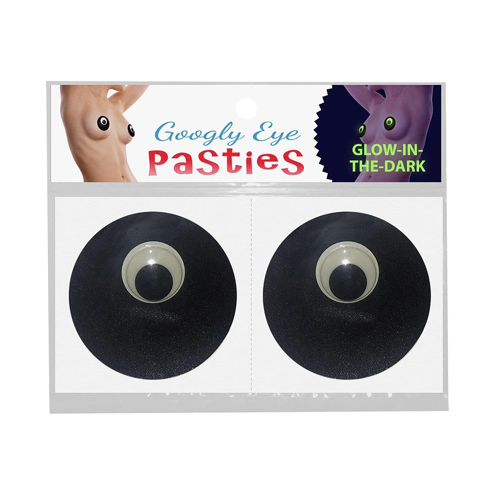 Glow-in-the-Dark Googly Eye Pasties glowing green on skin in a dimly lit bedroom