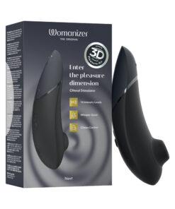 Womanizer Next Black device with soft silicone head on neutral background