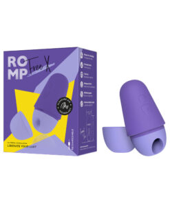 ROMP Free X clitoral stimulator in sleek black silicone with rose gold accents on a bedside table with travel case.