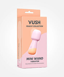 Compact pink silicone VUSH Peachy Mini Wand with peach-soft texture