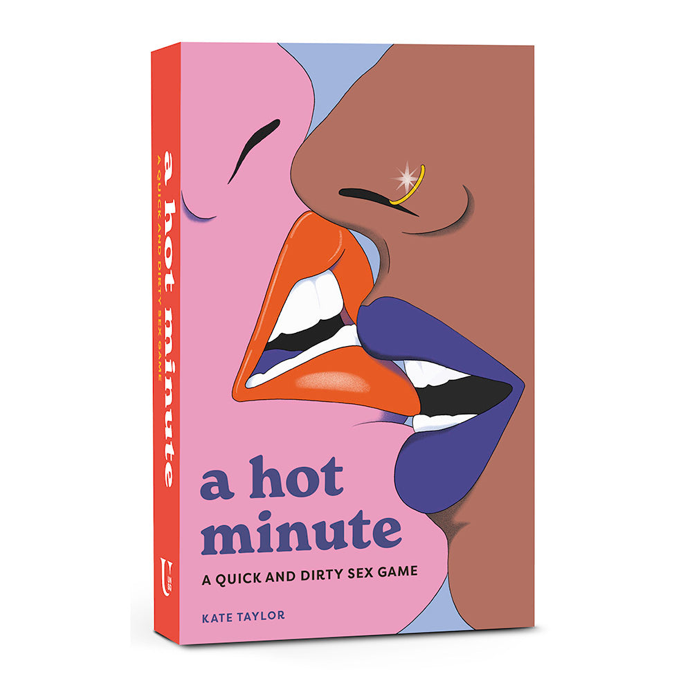 A Hot Minute Quick and Dirty Sex Game card deck box on a bedside table