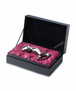 Njoy Pfun Plug stainless steel prostate massager isolated on a dark surface