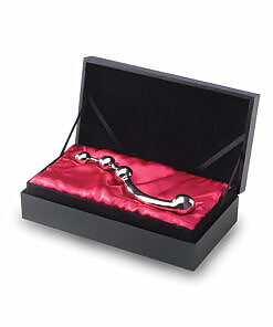 Stainless steel njoy Fun Wand with curved double-ended design and three graduated bulbs on a dark silk surface.