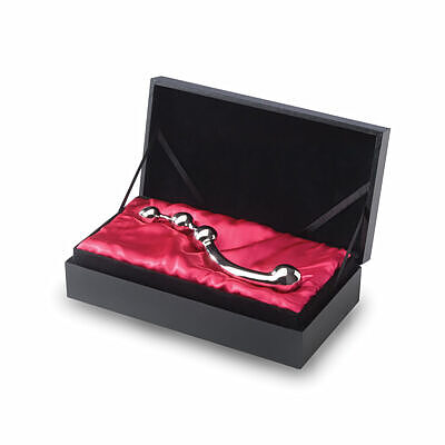 Stainless steel njoy Fun Wand with curved double-ended design and three graduated bulbs on a dark silk surface.
