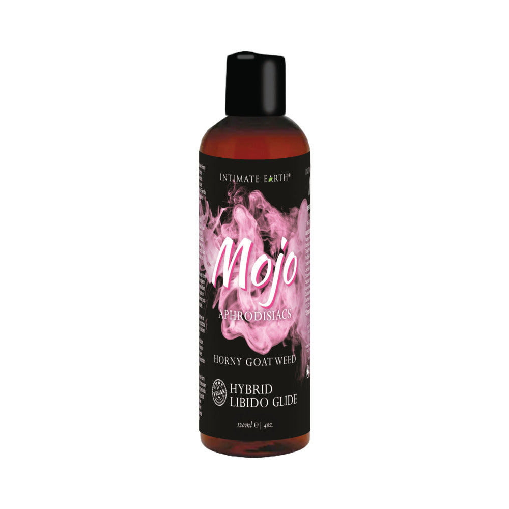 Intimate Earth Mojo Horny Goat Weed Hybrid Libido Glide bottle with pump on a nightstand