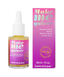 Love to Love Make Me Quiver Clitoral Arousal Serum 1 oz bottle on vanity with soft pink lighting.