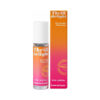 Love to Love Thrill Delight Pleasure Elixir 0.33 oz roll-on bottle on satin fabric beside a fresh coconut