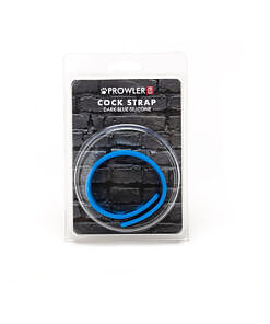Dark blue Prowler RED silicone cock strap resting on a satin surface