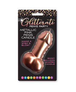 Pink Foil Penis Balloon Candle with metallic finish standing upright on a frosted birthday cake