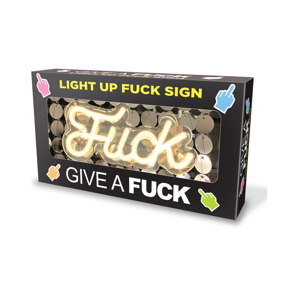 Neon Fuck Light Up Sign by Little Genie glowing on a dark wall with sequin sparkle visible against plexiglass surface