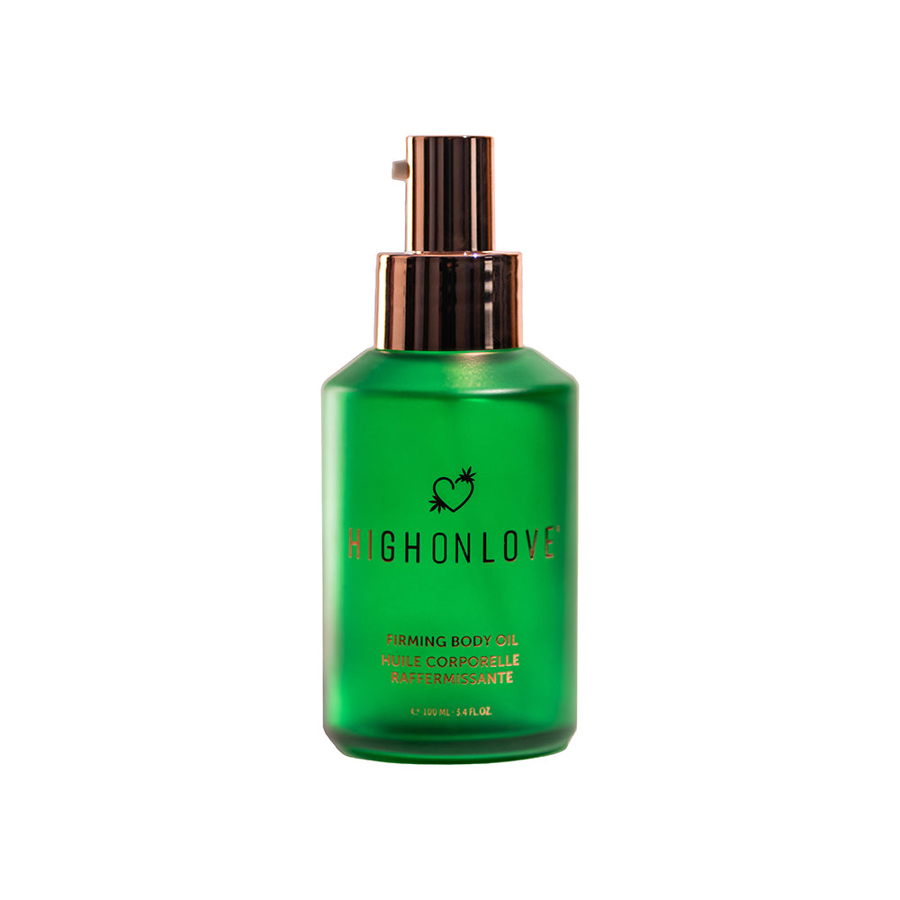 HighOnLove Firming Body Oil bottle with golden oil and natural botanical elements on a soft beige background.