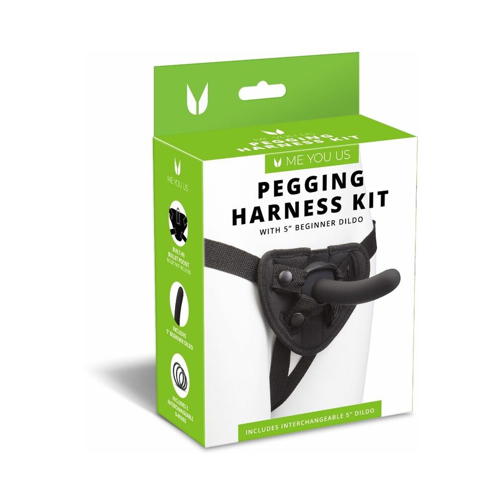 Me You Us Pegging Harness Kit with black adjustable straps and silicone O-ring laid flat on a clean white surface.