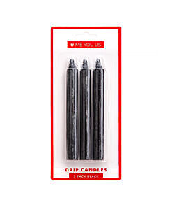 Three black Me You Us Drip Candles 3 Pack Black arranged on a sleek surface