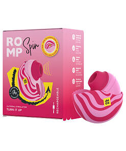 ROMP Spin travel rechargeable clitoral stimulator held in hand with its protective cover open