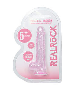 RealRock Realistic 5 in. Dildo with Balls Pink with suction cup on a flat surface.