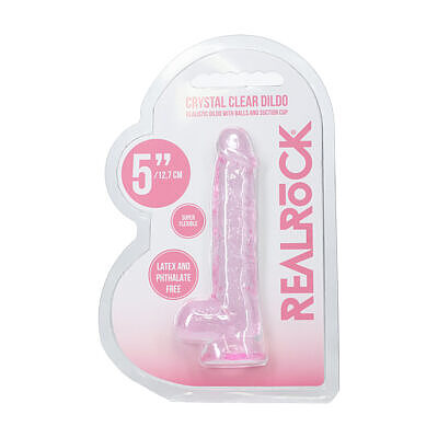 RealRock Realistic 5 in. Dildo with Balls Pink with suction cup on a flat surface.