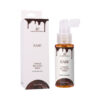 Doc Johnson Ease Throat Relaxing Spray 2oz bottle held against a dark background with chocolate drizzle