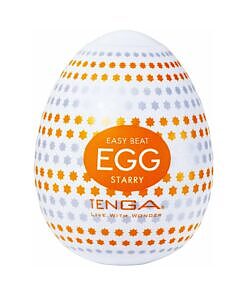 Tenga Egg Starry sleeve stretched open revealing densely-packed starry bump texture inside a white elastomer body on a plain background.