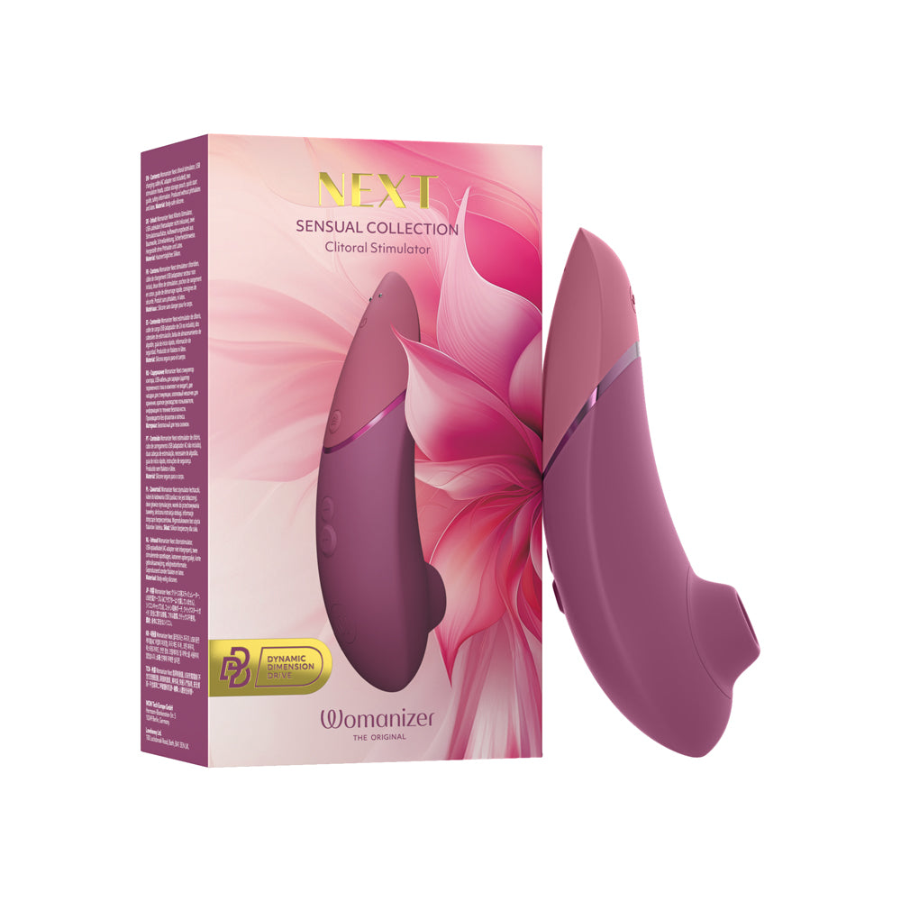 Womanizer Next Sensual Collection Dusky Pink on soft pink satin