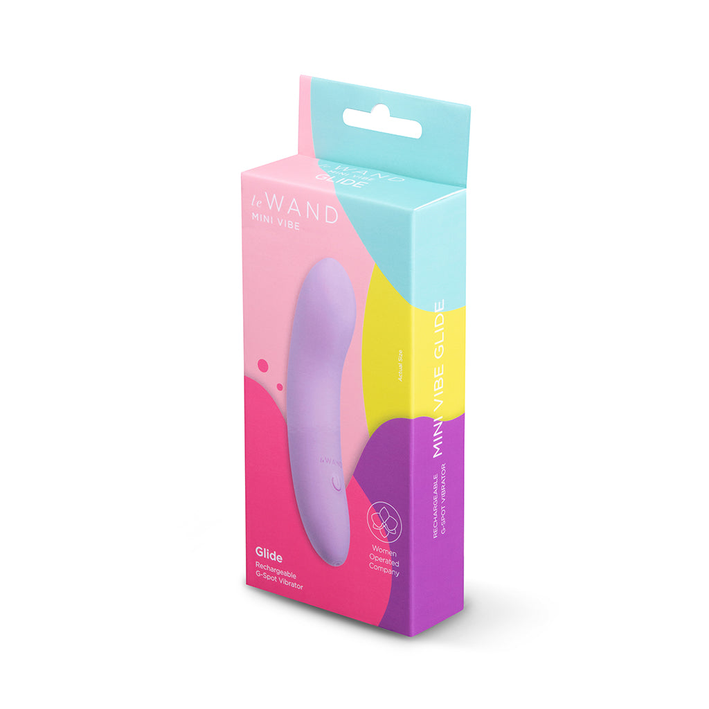 Le Wand Mini Vibe Glide compact G-spot vibrator with silicone tip on white background showing travel-ready size