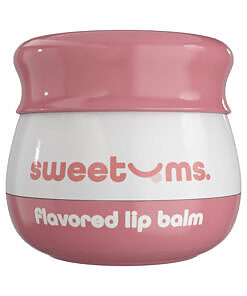 showcasing glossy pink balm next to fresh cherries.